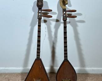 (2pc) Decorative Instruments | With decorative figural finials. - l. 34 in (longest)