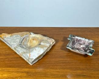 (2pc) VINTAGE ASHTRAYS | Including a flambe glazed ceramic ashtray signed on the bottom "Germany" and a carved agate ashtray. -  l. 10 in (largest)
