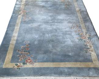 BLUE RUG | With floral sprays on a plain light blue ground with cream border. - w. 65 x l. 107 in