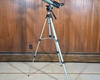 Celestron Spotting Scope | Celestron Ultima 80 angled spotting scope on tripod stand.
