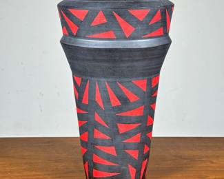 Cyril Dor (20th Century), Vase | Red and black painted pottery vase, signed on the bottom - h. 12.75 x dia. 7.75 in

