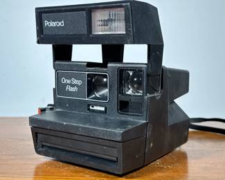 Polaroid Instant Camera | Polaroid One Step Flash instant film camera.
