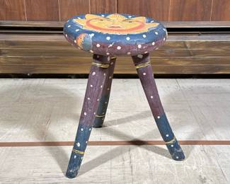 Folk Art Tripod Stool | Carved and polychromed wood, the seat with a sun face, having polka dots on the legs and gilt turnings. - h. 16 x dia. 11 in
