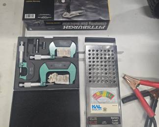 Clamping dial indicator and battery lead tester