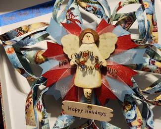 Beautiful hand made tree topper.