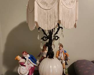 Beautiful pair of glass and metal cherub lamps.