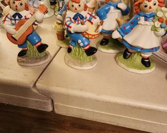 Raggedy Ann and Andy figurines.