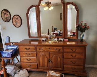 Beautiful triple dresser with mirror.  Sold separately or as a set with matching bedroom pieces.