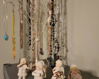 Several necklace and earrings sets.