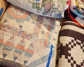 Many quilts and throws.