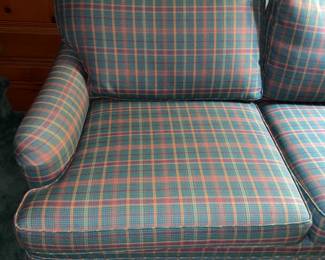 Green & Red Plaid Upholstered Couch With Decorative Pillows