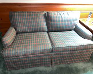Green & Red Plaid Upholstered Couch With Decorative Pillows