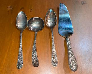 Stieff "Rose" Pattern Sterling Silver Flatware Set (12 Dinner Forks, 12 Seafood Forks, 12 Salad Forks, 12 Round Soup Spoons, 12 Dinner Knives, 12 Demi-Tasse Spoons, 12 Tea Spoons, 1 Sugar Serving Spoon, 1 Solid Serving Spoon, 1 Pierced Serving Spoon, 1 Ladle, 1 Pickle Fork, 1 Olive Fork, 4 Butter Spreaders, & 1 Pie Server)