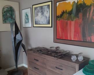 Art Work,  Brand new dresser with nightstand and matching Headboard for double bed,  Metal wall hanging on top of dresser. 