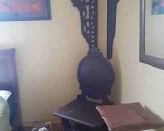 Pair of antiue  wood  stick and ball on wall, unusual chair, and oak table with damaged top