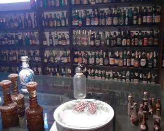 Beer bottles and glass in basement
