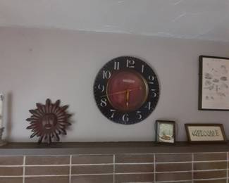 Carved wooden sun, pair of pewter candlesticks, etc