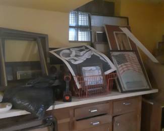 Frames and artwork in basement