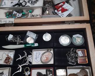 Some of the jewelry, coins, etc
