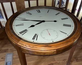 REDUCED!! $390 Howard Miller battery-operated clock table. Vintage, sturdy, in excellent condition. Rare find. 41x41x32"