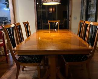 Thomasville dining set with two leaves, seats 10. Maple with ebony inlay and brass details