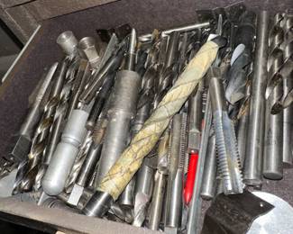 Hand tools, nuts, and bolts.