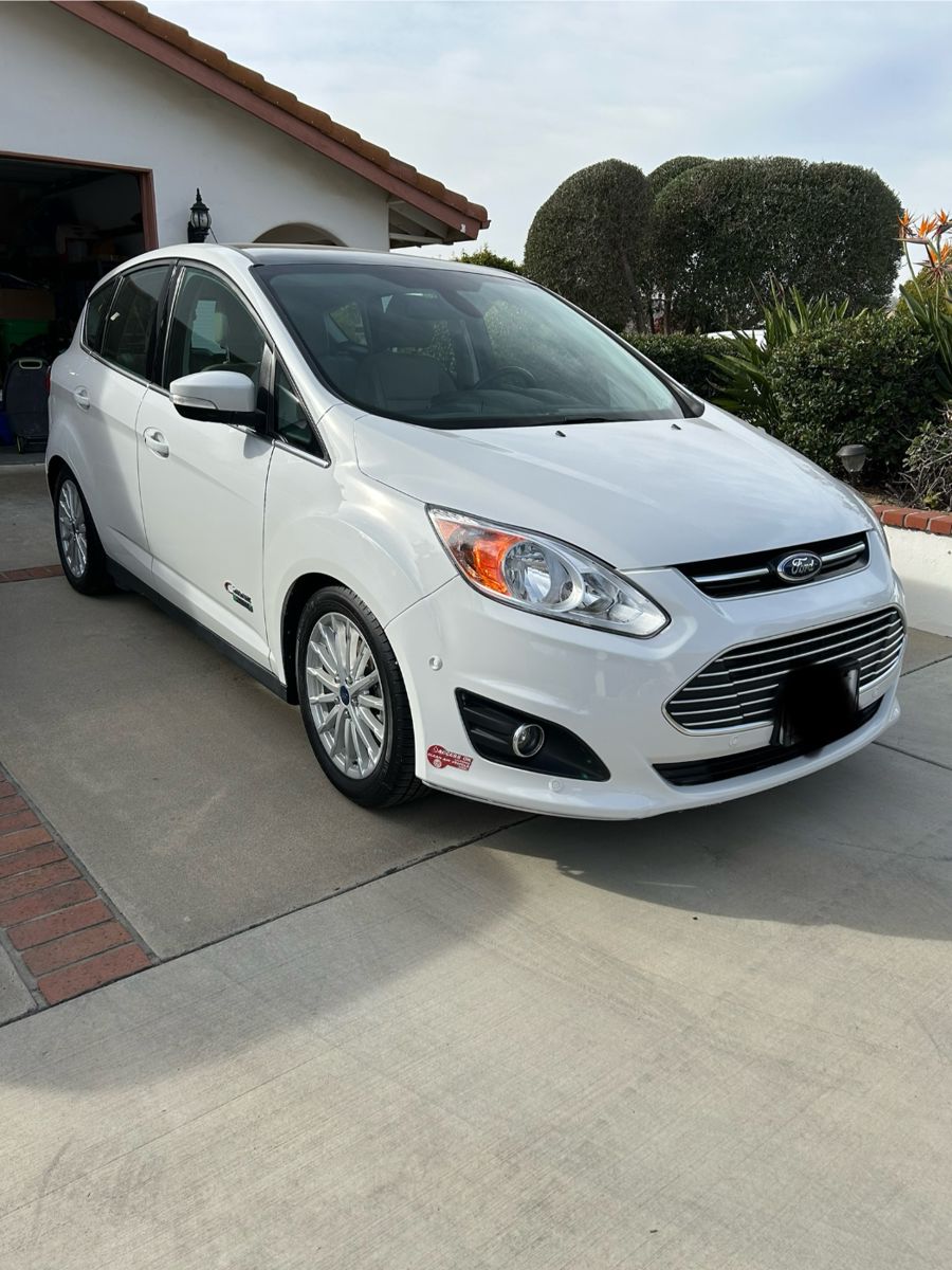 2016 Ford C-Max Hybrid with 46,800 miles.