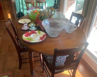 Antique drop leaf table and four chairs 