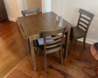 Brand new William Sonoma table and three chairs