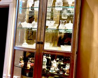 Large lighted silver tone display cabinet