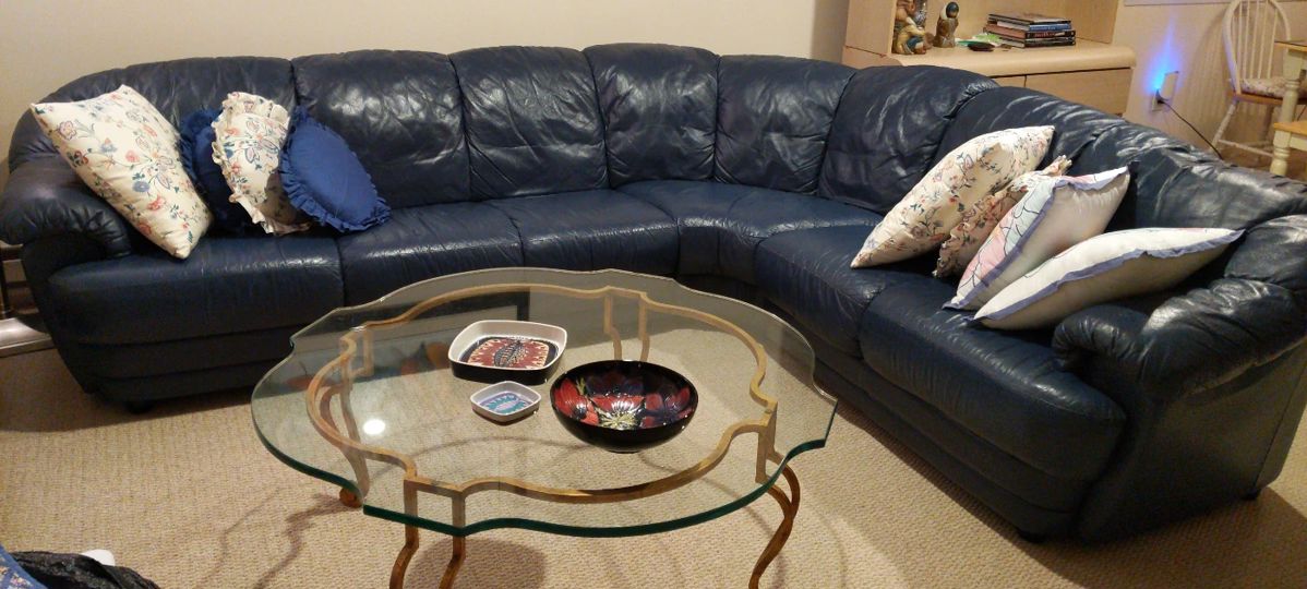 Natuzzi L-shaped sectional sofa (Italian leather)
101"L (approx distance from left armrest to end of curved center piece) 
40"W
32.5"H

seats 6