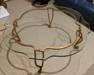 Cocktail table. Metal frame with glass top.