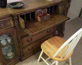 old fashioned credenza
62"L
18"W
38"H

6 drawers and 2 lockable glass cabinets (key included)
can function as a desk