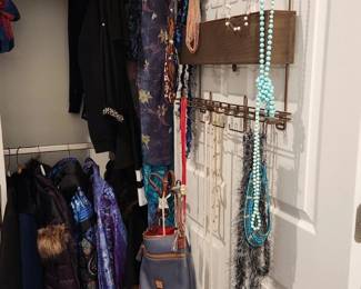 Two Closets of Women's Clothing and Accessories