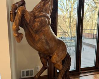 Beautifully carved wood Horse. Owner purchased at auction 25 plus years ago in north New Jersey. Possibly made in Singapore, No Signature…. 7 ft tall approx
Weighs 200 plus pds..