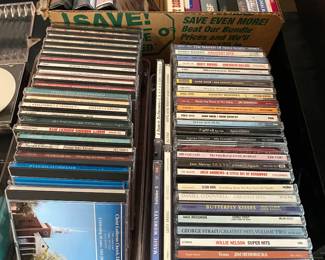 2 linear feet of CDs and DVDs