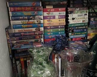 Lots of vintage VHS tapes, including Disney.