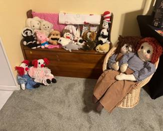Lots of sweet plush animals. Also, children's storage bench.