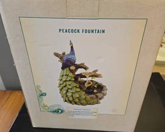 Cracker Barrell peacock fountain 