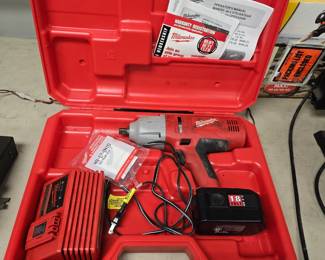 Milwaukee impact gun working and charges 