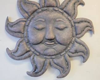 large metal sun face 