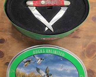 case xx pocketknife in collectors tin with duck call 