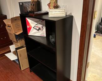 Shelving Unit with various Office Supplies 