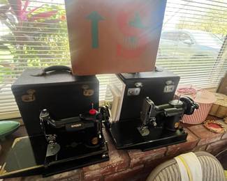 Featherweight singer model 221 
2 available - AD , AG
