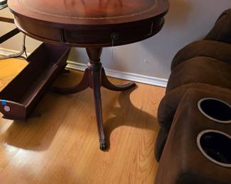 Round occasional table with drawer