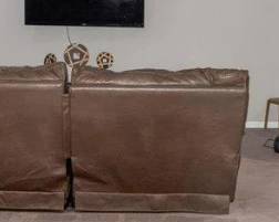 4 Piece Recliner Brown Leather sectional.  Seats 6.  1 Sofa piece displayed in the theater room  sofa picture. All Recliners except the Center Shaped Sofa Seat Practically New