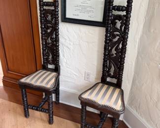 Antique high back chairs.