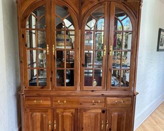 Beautiful china cabinet which can serve as a bookshelf and has plenty of storage space.  Leave as is or paint in your favorite color.