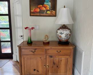 This is a small buffet where the top opens to make a larger serving space.