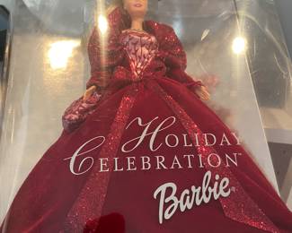 Several Barbie dolls in original boxes.